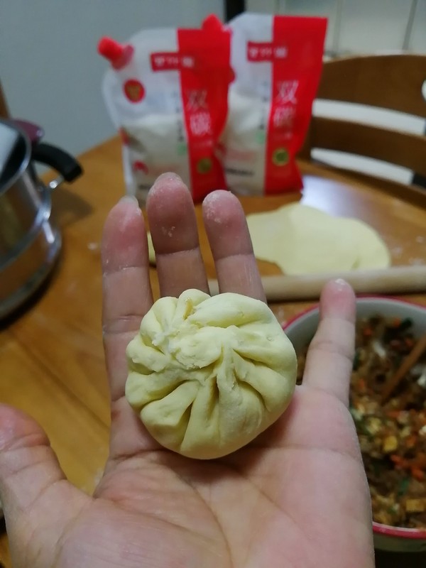 美味又健康还有不错的颜值~~南瓜老面包子的做法步骤:16