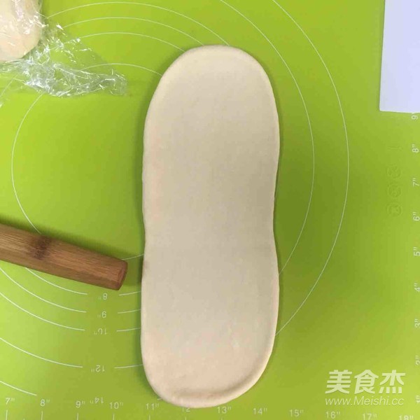 椰蓉葡萄干面包卷的做法步骤:11