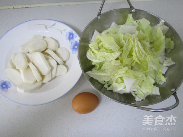 太阳蛋白菜干贝年糕汤的做法步骤：1