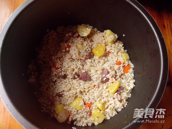腊肉土豆糯米饭的做法步骤:14