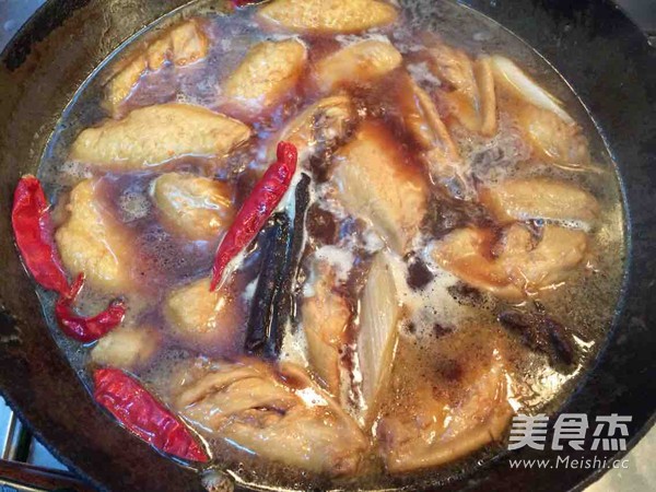 松蘑炖鸡翅的做法步骤:13