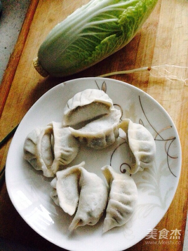 酸辣白菜粉条煮饺子的做法步骤：2