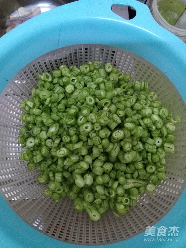 瑶柱鱿鱼干花肉豆角饭的做法步骤:5