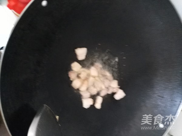 瑶柱鱿鱼干花肉豆角饭的做法步骤:7