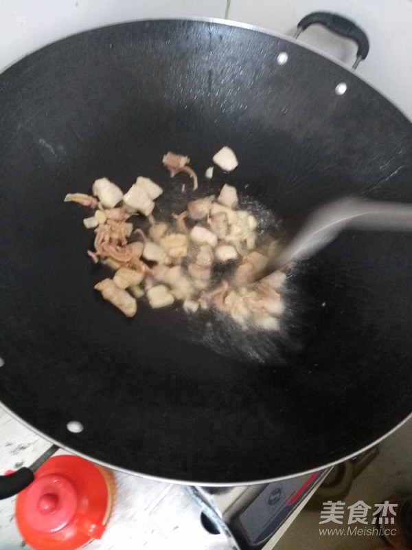 瑶柱鱿鱼干花肉豆角饭的做法步骤:8